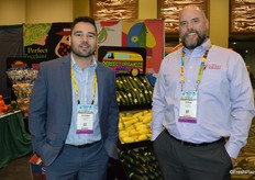 Pedro Balderrama and Josh Acuna with SunFed are standing in front of an organic display. The company is building its organic program.